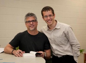 Garth Stein visits with a student at St. Petersburg College.